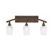 Longshore Tides Asaru 3 - Light Dimmable Vanity Light, Glass in White/Brown | 13.5 H x 26.5 W x 8.5 D in | Wayfair 3BFB6999FC494DE8BCA1EA2B768BAEFA