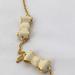Kate Spade Jewelry | Going To Consignment In 2 Weeks Kate Spade Cream Enamel Bow Gold Necklace | Color: Cream/Gold | Size: 32"