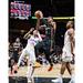 Dejounte Murray Atlanta Hawks Unsigned Driving to the Basket in Black Jersey Photograph