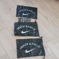 Nike Bags | Bundle 3 Black Nike Track & Field Drawstring Shoe Bags & Nike Wrist Sweatbands | Color: Black | Size: Os