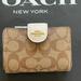 Coach Bags | Coach Medium Corner Zip Wallet In Signature Canvas | Color: Brown/White | Size: Os