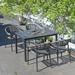 Corrigan Studio® Kristhel Rectangular 4 - Person Outdoor Dining Set Stone/Concrete/Wicker/Rattan in Gray | 47.24 W x 31.5 D in | Wayfair
