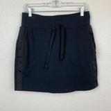 Athleta Shorts | Athleta Downtown Metro Skort Small Tall Black Ribbon Side Stripe Lined Pockets | Color: Black | Size: S