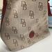 Dooney & Bourke Bags | Dooney Bourke Women's Tote Bag Red Leather Tassle Fabric Logo Zipper | Color: Brown/Red | Size: Os