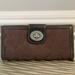 Coach Bags | Authentic Signature Turnlock Coach Wallet | Color: Brown | Size: 7.5in X 4in