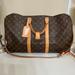 Louis Vuitton Bags | Louis Vuitton Duffle | Color: Red | Size: 20” X 14”