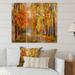 DESIGN ART Designart Forest Full Of Fallen Leaves In Autumn Lake House Print on Natural Pine Wood - 3 Panels 45 inches x 40 inches - 3 Panels