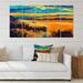 DESIGN ART Designart Little Boat At The Horizon Of A Lake During Sunset Nautical & Coastal Canvas Wall Art Print 60 in. wide x 28 in. high - 5