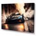 17 Stories Black McClaren Sports Car Racing in Italian Street IV - Print on Canvas Metal in Black/Orange | 24 H x 32 W x 1 D in | Wayfair