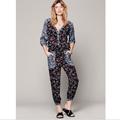 Free People Pants & Jumpsuits | Free People Leia Floral Multicolor Long Sleeve Rayon Jumpsuit | Color: Black/Purple | Size: S