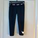 Nike Bottoms | Nike Dri-Fit Big Nike Logo Black/ White Leggings, Size 4/5 | Color: Black/White | Size: 4/5