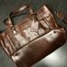 Dooney & Bourke Bags | Dooney And Bourke Florentine Vacchetta Leather Satchel Messenger Bag | Color: Brown | Size: Os