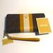 Michael Kors Bags | Michael Kors Center Stripe Wallet Leather Marigold Brand New With Tags | Color: Brown/Yellow | Size: Large