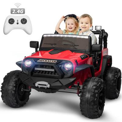 JOYRACER 24V Electric Ride On Truck Car 4WD Motorized Vehicles w/ 2 Seaters& Remote Control Plastic in Red | 31.5 H x 48.5 W x 34.6 D in | Wayfair