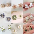 Koreanischer Stil kleine Gänseblümchen Blume Ohrclip Ohrringe Frühling einfache weiße lila