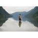 A Young Man Wearing A Swimsuit Stands In Cameron Lake; British Columbia Canada Poster Print (19 x 12)