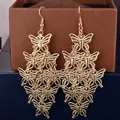 Crochet d'oreille en métal à motif papillon Long paragraphe de mode exagéré tempérament bijoux