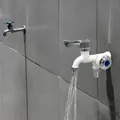 Robinet d'eau universel à Double sortie pour salle de bains évier robinet d'eau à Double bec