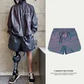 Short décontracté tout assressentipour hommes et femmes short coloré au laser marque de mode