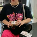 T-shirt à manches courtes en coton imprimé léopard rose pour femmes mode de rue K-pop noir
