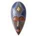 'Hand-Painted Vibrant African Wood Mask Crafted in Ghana'