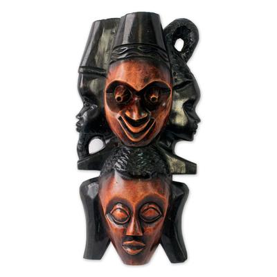 A Happy Family,'African wood mask'