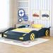 Zoomie Kids Aahan Race Car-Shaped Platform Kids Bed w/ Wheels & Storage, Solid Wood in Blue | 15.7 H x 55.3 W x 90.6 D in | Wayfair