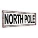 The Holiday Aisle® North Pole Christmas Metal Sign Metal | 11.5 H x 31 W x 0.04 D in | Wayfair 39991AF91F6245E8BB893BB9D513DC09