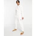 Vans Small Logo fleece joggers in cream-White