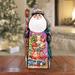 The Holiday Aisle® Clara w/ Nutcracker Santa Wood Carved Masterpiece Figurine By G. Debrekht Wood in Brown/Red | 7 H x 4 W x 4 D in | Wayfair