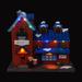 The Holiday Aisle® Christmas Village Hardware Store - Lighted Musical Snow Village Collectible Building | 8.46 H x 9.84 W x 5.1 D in | Wayfair
