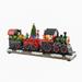 The Holiday Aisle® Christmas Figurines Accessories - Santa's Train | 1 H x 3.94 W x 15.94 D in | Wayfair 234DF38AB4C440F1A06DA76B35491FB9