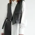 Gilet corto asimmetrico chic da donna Femme Pu ecopelle moda giacca senza maniche sottile allentata Mujer gilet con tasca grande con scollo a V
