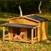 Outdoor Dog House 47.2 Large Wooden Dog House with Porch for 2 Medium or Small Dogs Solid Wood 2 Doors Puppy Shelter Insulated Dog Home with Elevated Floor and Asphalt Roof Loading 100 Lbs