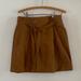 Free People Skirts | Free People Tan Camel Faux Leather Mini Skirt With Tie Belt Size 10 | Color: Brown/Tan | Size: 10