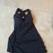 Lululemon Athletica Tops | Black Lululemon Tanktop Cross Over Back | Color: Black | Size: 4