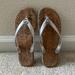 Michael Kors Shoes | Gently Used Size 6 Michael Kors Corked Flip Flops | Color: Silver/Tan | Size: 6