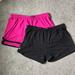 Under Armour Shorts | 2 Pair Of Under Armour Shorts Pink Size M Black Size S | Color: Black/Pink | Size: M