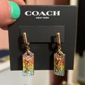 Coach Jewelry | Coach Rainbow Crystal Embellished Logo Gold Dangle Earrings Nwt | Color: Gold | Size: Os