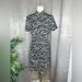 Michael Kors Dresses | Michael Kors Animal Print Turtle Neck Short Sleeve Mini Dress Cream/Black Sz L | Color: Black/Cream | Size: L