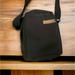 Nike Bags | Nike Crossbody Purse Bag, Black Canvas, Zipper W/ Pockets For Card’s Inside Euc | Color: Black | Size: Os