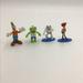 Disney Toys | Disney Figurines Cake Toppers 3/$18 | Color: Green/White | Size: Osbb