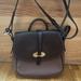 Dooney & Bourke Bags | Dooney & Bourke Brown And Black Leather Saddle Bag. Euc. | Color: Black/Brown | Size: Os