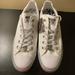 Converse Shoes | Miley Cyrus X Converse Ox Low Top Nwt | Color: Silver/White | Size: 8.5