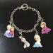 Disney Jewelry | Disney Frozen Charm Bracelet Elsa Anna Olaf | Color: Silver | Size: Os