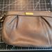 Coach Bags | Coach Taupe Leather Small Wristlet Clutch - Euc | Color: Tan | Size: Os