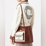 Burberry Bags | Burberry Mini Two-Tone Canvas And Leather Pocket Bag | Color: Brown/Cream | Size: 23 X 6 X 26.5 Cm