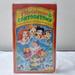 Disney Media | Christmas In Cartoontown Vhs Tape Vintage 1991 Clamshell Cinderella Snow White | Color: White | Size: O/S