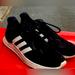 Adidas Shoes | Adidas Fy5951 Questar Flow Nxt Core Men’s Black Sneakers Size 12 | Color: Black/White | Size: 12