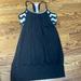 Lululemon Athletica Tops | Lululemon Black Flowy Tank Top With Black And White Built In Sports Bra Size 4 | Color: Black | Size: 4